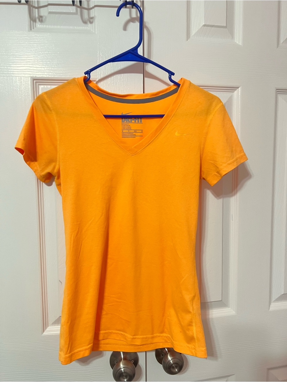 Nike Women's Short-Sleeve V-Neck Tee in Orange size XS